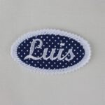 Oval patch with embroidered name